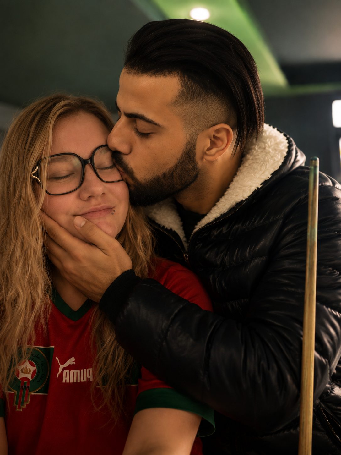 A soft cheek-kiss moment