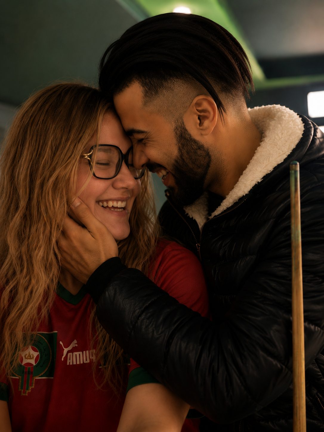 Simo and Lizzie smiling forehead to forehead
